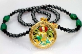 Thai Amulet silvered with haematite chain and gilt casing